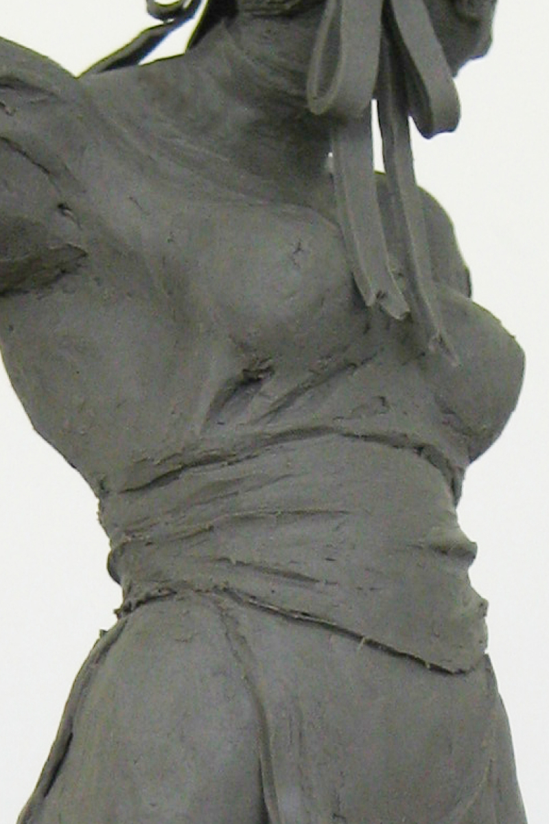 Close-up of the upper body and belt of the Chun-Li plasticine sculpture.